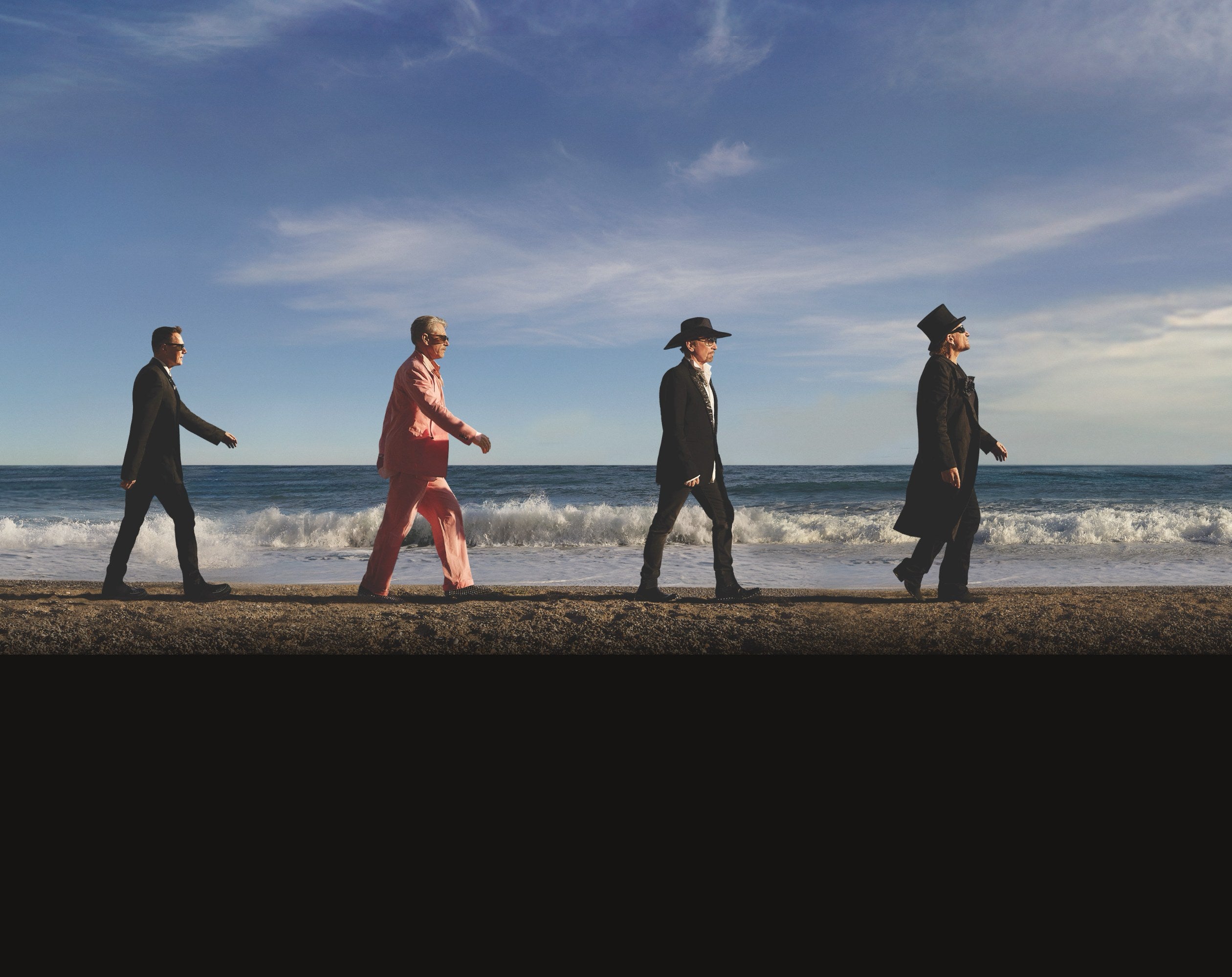 U2 em imagem promocional da era Carnaval De Luz